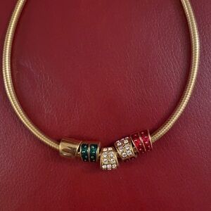 Joan Rivers brand gold color costume jewelry necklace 16 to 20 inches.